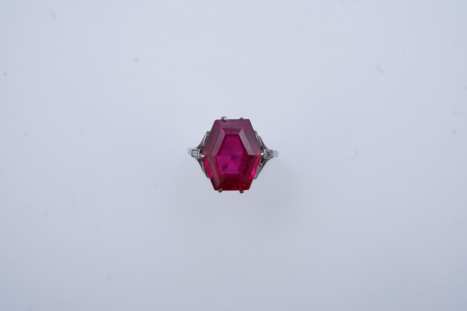 A synthetic ruby and diamond ring